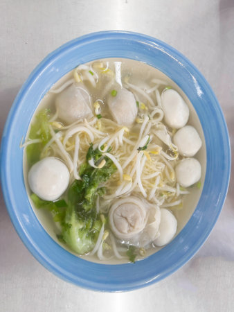 Soup noodle with fish balls, one of the most famous Thai street food, stock photo