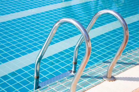 Swimming pool clear blue water, stock photo