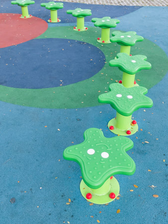 Children playground equipment outdoors park area, stock photo