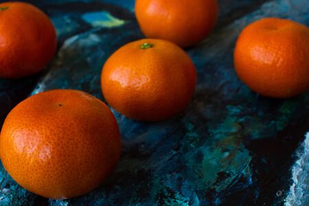 Mandarin orange in the picture. canvas razrisovon blue redの写真素材