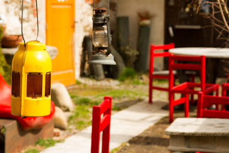 red designer chairs and a table in the form of human feetの写真素材