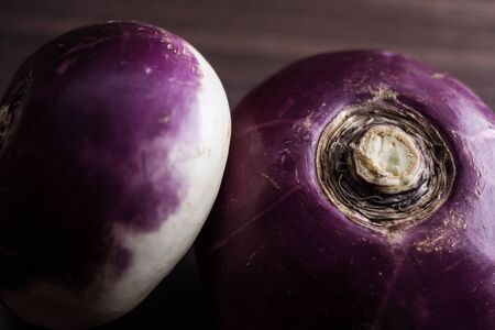 root vegetables from the garden on a brown backgroundの写真素材