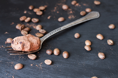 Chocolate truffles in an unusual shape with metal cutleryの写真素材