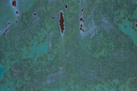 metallic texture. rust on a metal shieldの写真素材