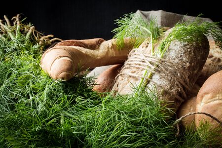French buns variety of wheat with green dillの写真素材