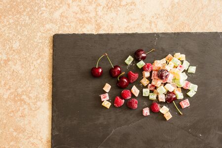Turkish Delight with ripe raspberries and blueberriesの写真素材