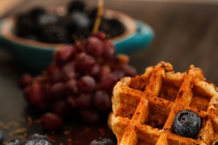 Belgian waffles with blueberries and grapes Breakfast