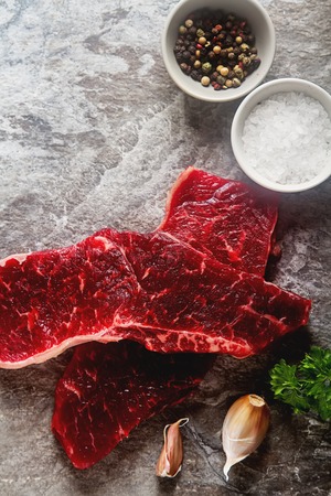 A quality piece of meat, beef. Dark backgroundの写真素材
