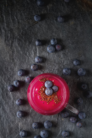 Fresh homemade smoothie with  berries. Dark backgroundの写真素材