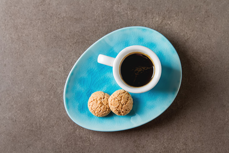 Italian homemade espresso coffee in a white mug. Dark backgroundの写真素材