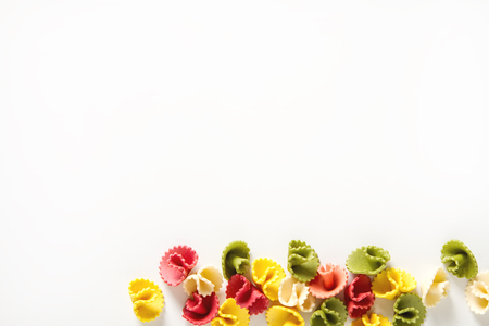 Multicolored Italian pasta. Delicious dinner for children. Pasta the boat. White backgroundの写真素材