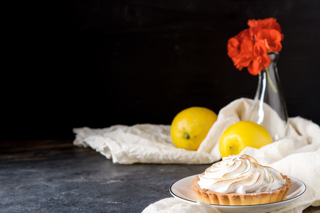 French dessert. Tartlet with lemon. Dark backgroundの写真素材