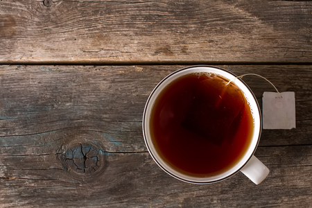 A cup of delicious Chinese tea. Dark background. Tea ceremonyの写真素材