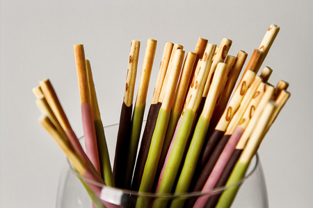 Box for cookies with bright flogging. Japan sweets. Bright white backgroundの写真素材
