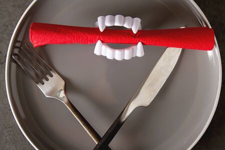 Serving the table for a Halloween holiday. Dark backgroundの写真素材