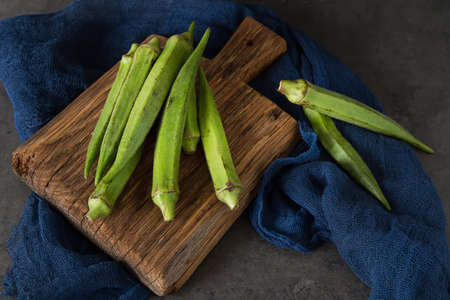 Lady Fingers or Okra. Dark background. , Space for texの写真素材