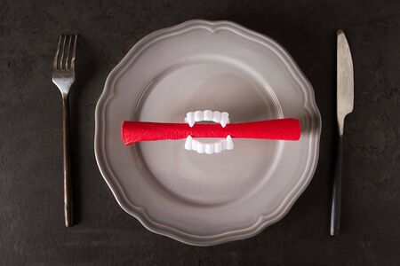 Serving the table for a Halloween holiday. Dark background