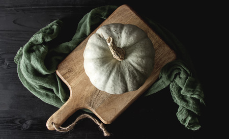 Autumn meal. Ripe pumpkins. Holiday Hallow. Dark backgroundの写真素材