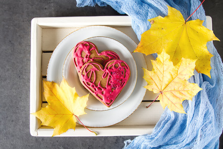 Beautiful gingerbread cookies in the form of a heart for the St. Valentine's Day holiday. Light backgroundの写真素材
