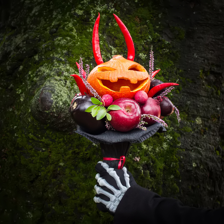 The original unusual edible bouquet of vegetables and fruits in a hands