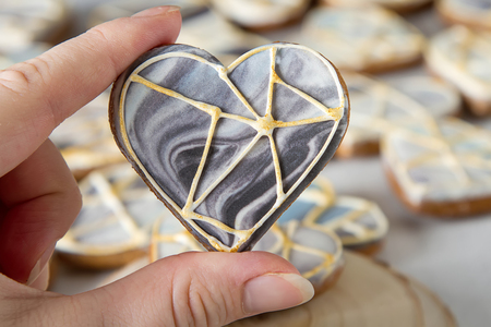 Ginger honey cakes in the form of a heart for Valentine's Day. Light backgroundの写真素材