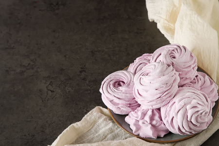 Pink marshmallows, sweet, delicate dessert. Dark backgroundの写真素材