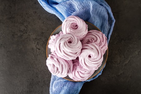 Pink marshmallows, sweet, delicate dessert. Dark backgroundの写真素材