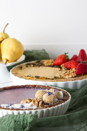 Raw desserts, delicious and healthy food for vegans. Light backgroundの写真素材