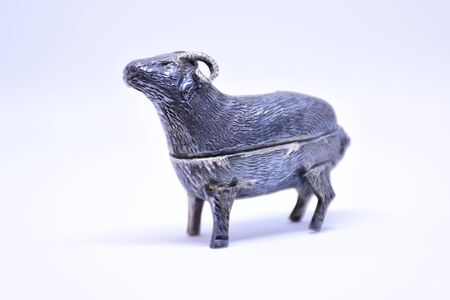 Silver goat on white backgroundの写真素材