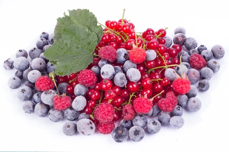 Veried berries with leaf isolated on whiteの写真素材