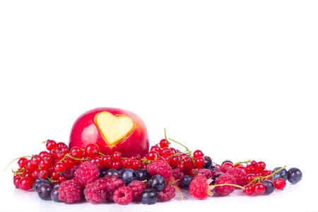 Apple with berries isolated on white