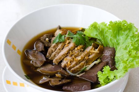 Image of Thai soup with duck meat.