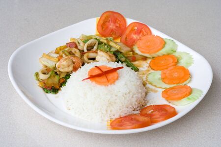 Thai spicy seafood with rice and vegetable.の写真素材