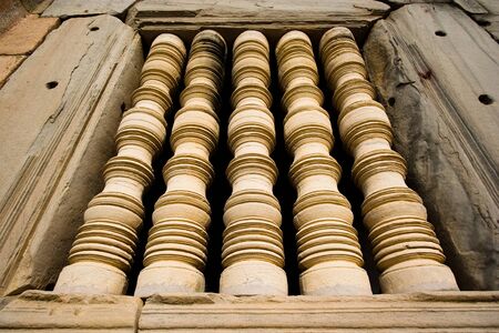 Antique pillar at a window from Pimai stone castle in Thailand.の写真素材