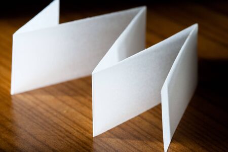 Image of paper is folded in geometry with light and shadow.の写真素材