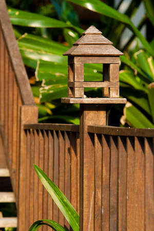 Wooden designed handrail of a pathway outsied of a garden.の写真素材