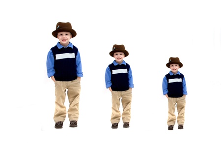 Little boy wearing a hat and khakis is represented in three sizes, small, medium and large   Images represent growth throughout childhood の写真素材