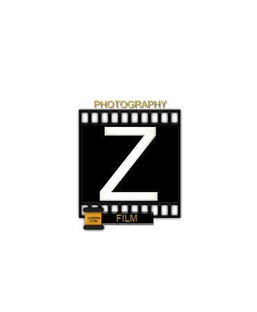 The letter Z, in the alphabet set "Camera Film" is white and is sitting on a black strip of film.  A small film canister sits at base of letter.の写真素材