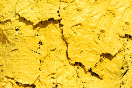 Surface of tree is painted a brilliant yellow.  