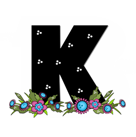 The letter K, in the alphabet set "Country Lane Two" is pink with black outline.  Letter sits on arrangement of country flowers in pink and blue.の写真素材
