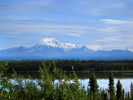 Cabin sits on the shores of Willow Lake.  Surrounded by wilderness and forest, the view Mount Drum...