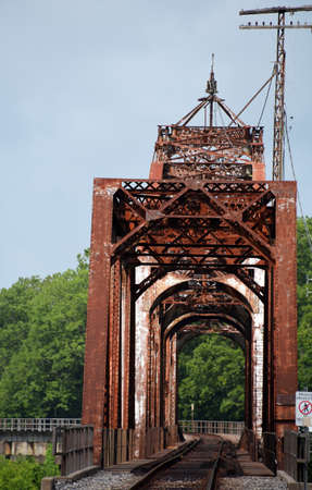Railroad tracks curve and disappear after crossing the White River at Clarendon, Arkansas.  Bridge...