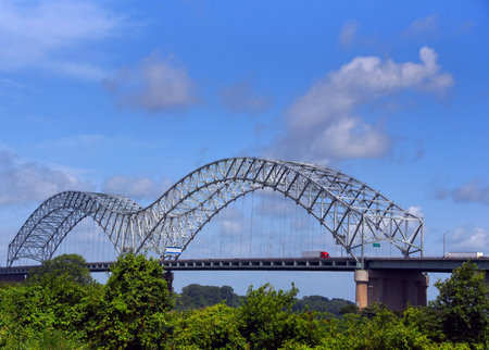 Mississippi River Bridge carries Interstate 40 through Memphis, Tennessee.  Red cabbed truck crosses on bridge.の写真素材
