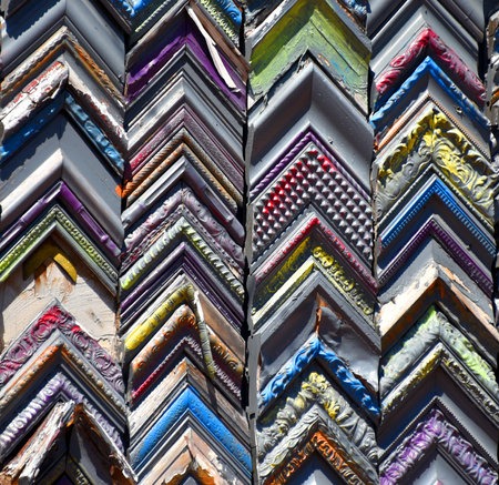Background image of stacks of picture frames.  Corners are in rows.
