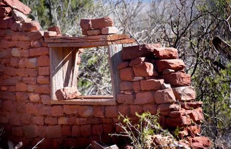 Window refuses to crumble as the rest of the house has.  Boards frame opening in very old adobe...