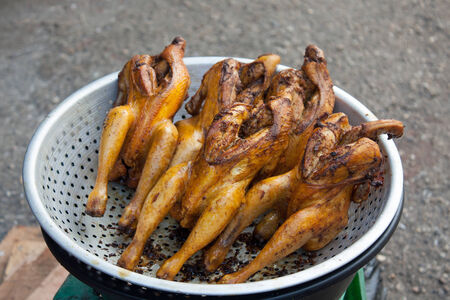 Cooked chicken on the street in Myanmarの写真素材