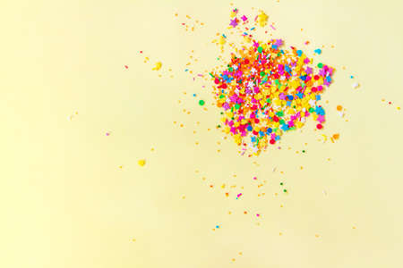 Bright confetti fireworks. Explosion of sweets. Festive card. Copy spaceの写真素材