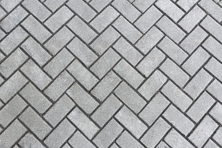 Sidewalk gray tiles diagonally. Texture, pattern. Copy spaceの写真素材