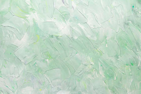 Gently green background with paint strokes. Spring or summer backdrop. Pastel. Copy space