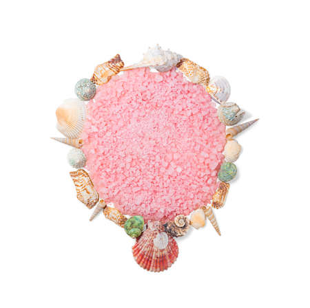 Pink sea salt with shells in the form of a circle. Isolated. Copy spaceの写真素材